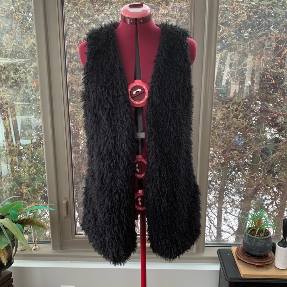 Faux fur vest. NWOT. Never worn.